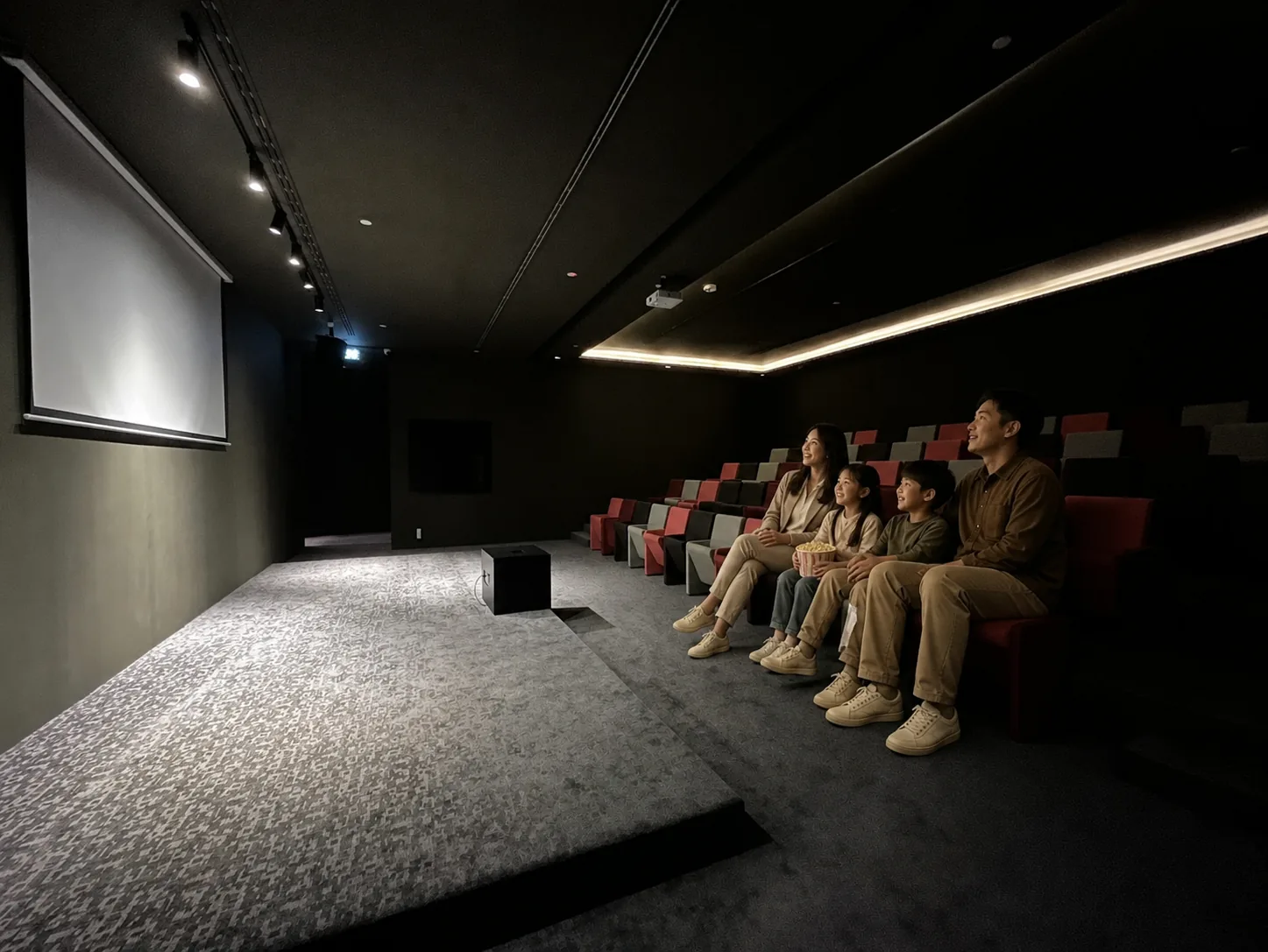 A family enjoying a film together in the MyToday private cinema